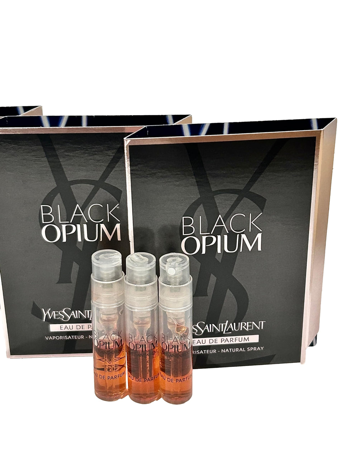 YSL Black Opium sample packaging display for travel testing.