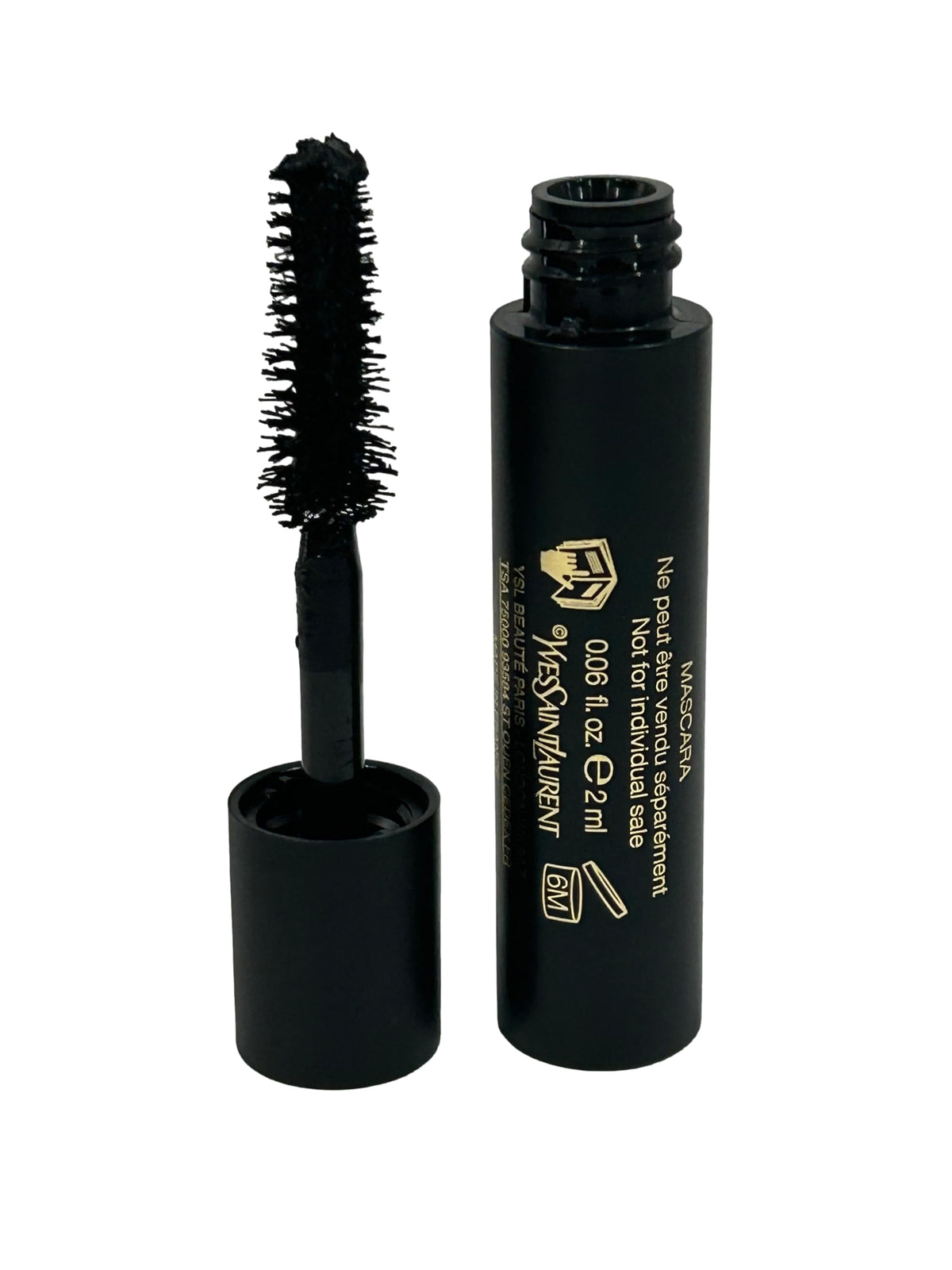 YSL Lash Clash Mascara wand application demonstrates bold lash definition on the go