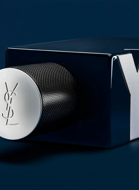 Close-up of Y Le Parfum cap with silver Y emblem for premium display