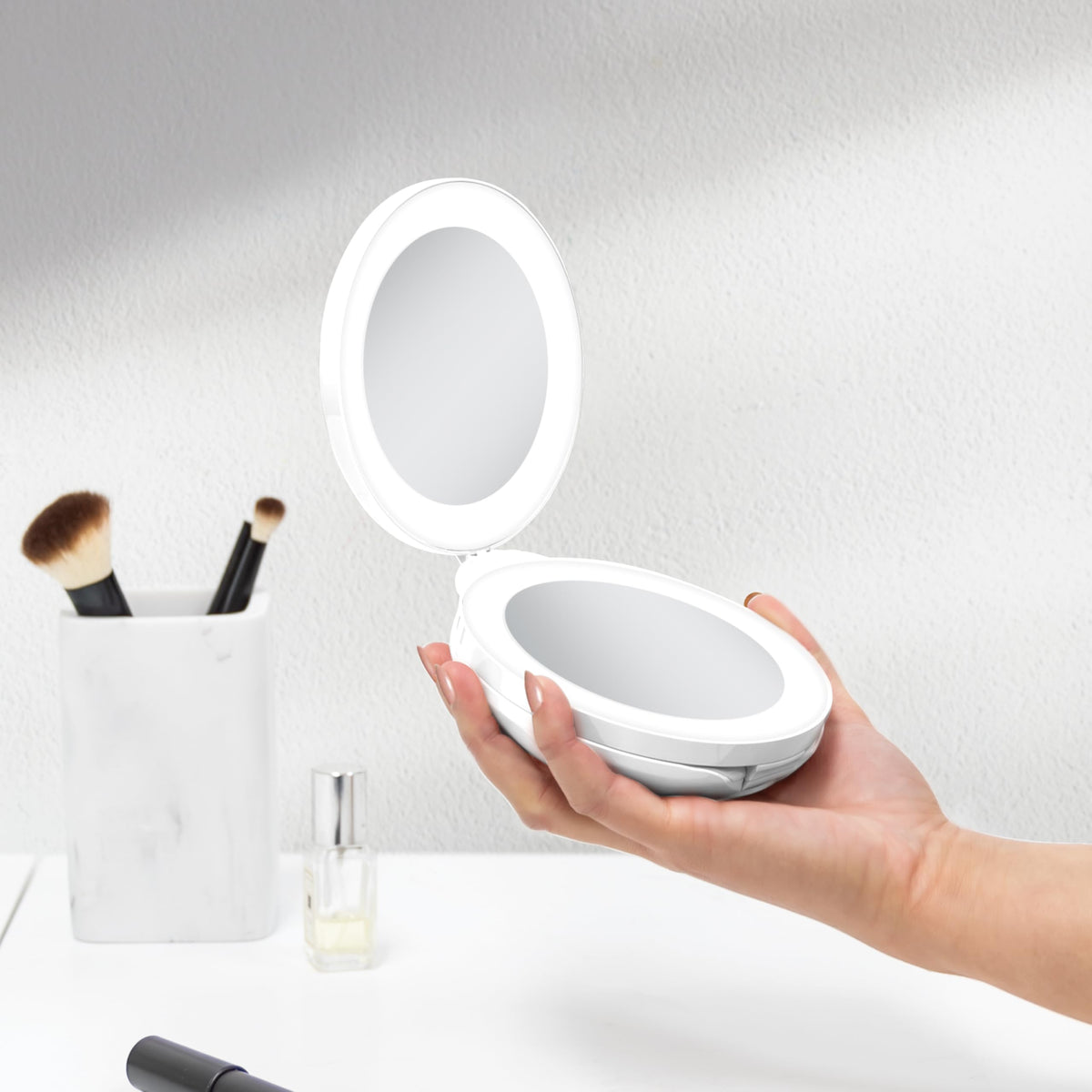Zadro folding-design mirror folds flat for easy packing.