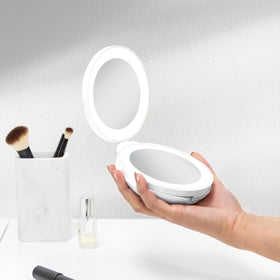Zadro folding-design mirror folds flat for easy packing.
