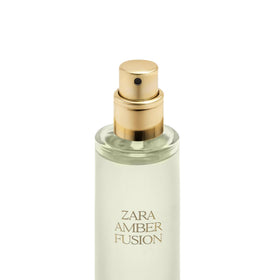 Zara Amber Fusion flacon front view with subtle gold accents and compact size.