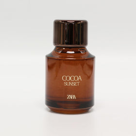 Close-up of creamy texture on Zara Cocoa Sunset bottle