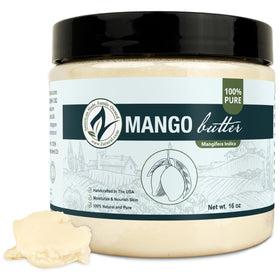 Zatural Mango Butter jar on wood for rich hydration and conditioning.