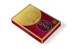 Zenia henna cone texture close-up highlights smooth paste for even application.
