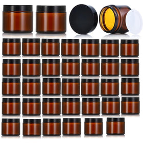 Zentriqlla amber glass jar 1oz with black lid for travel-friendly storage.