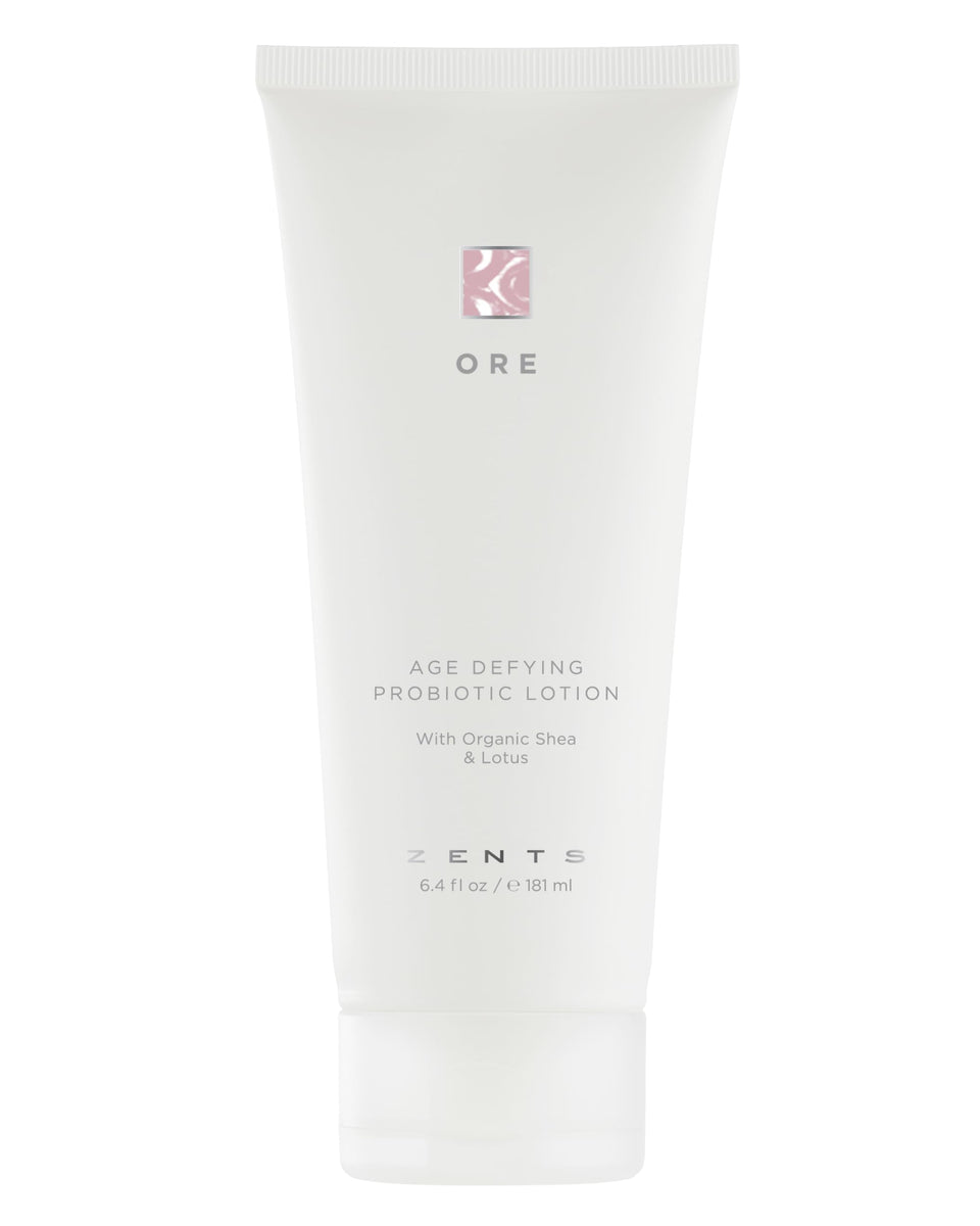 Zents Ore lotion jar close-up showing creamy texture for deep hydration.
