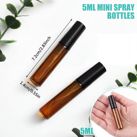 Zhehao 5ml glass atomizer delivering a fine mist for scents.