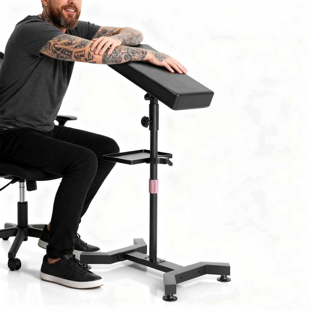 ZHOOGE tattoo arm rest stand in-use during tattooing sessions shows ergonomic setup.