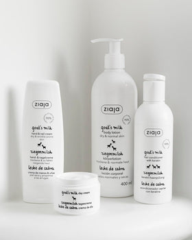 Hands applying Ziaja Goat's Milk Body Lotion to dry skin for daily hydration