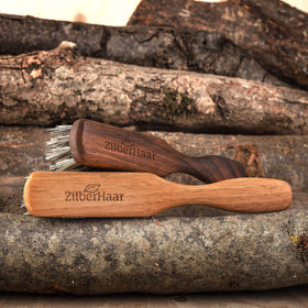 ZilberHaar vegan beard brush enabling smooth grooming strokes.