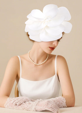 Zinniday white flower headband close view soft yet statement-making for formal occasions