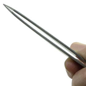 Zizzili Basics Ingrown Hair Tweezers showing calibrated tension for gentle pull