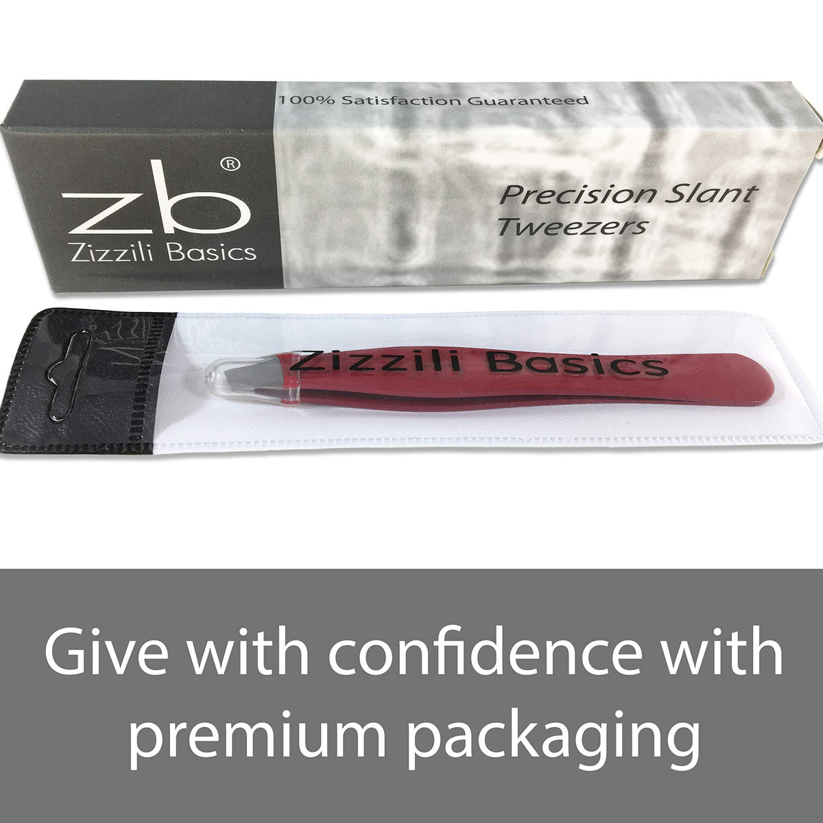 Zizzili Basics tweezers in hand, ruby red for comfortable grip.