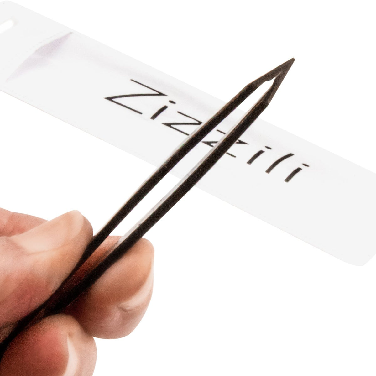 Zizzili Basics tweezers with slant tip for precise eyebrow shaping and hair removal.