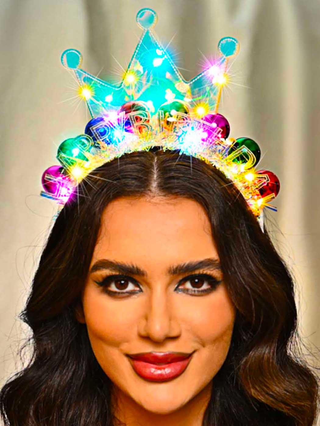 Zoestar LED birthday headband shines under party lights for photos.