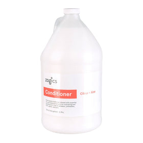 Zogics Citrus + Aloe conditioner bottle pour demonstrates easy dispensing for facilities.