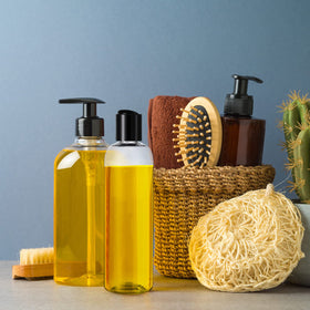 Zubebe refillable travel containers ideal for shampoo, lotion, and body wash.