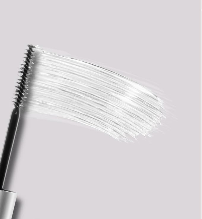 Zuzu Luxe Clear Mascara brow usage close-up demonstrating brow shaping with subtle shine.