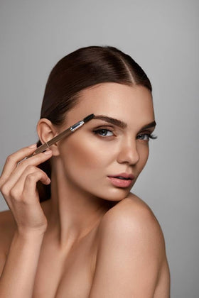 Zuzu Luxe Cream Brow Pencil Flax Blonde swatches on arm displaying natural shade