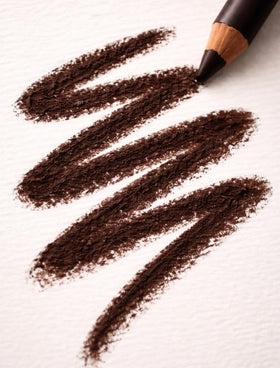 Zuzu Luxe Eye Defining Pencil Tobacco Brown close-up shows smooth glide and rich pigment